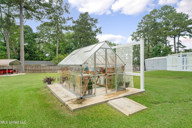 view of outdoor structure with a yard