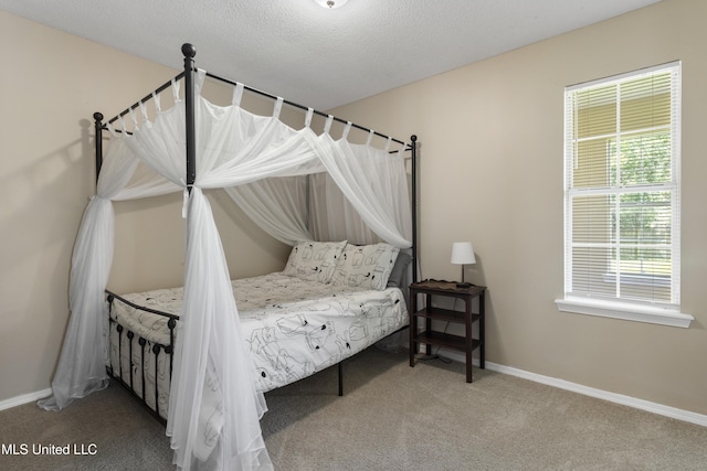 2383 Trafalgar Dr, Biloxi, MS 39531 - carpeted bedroom featuring baseboards