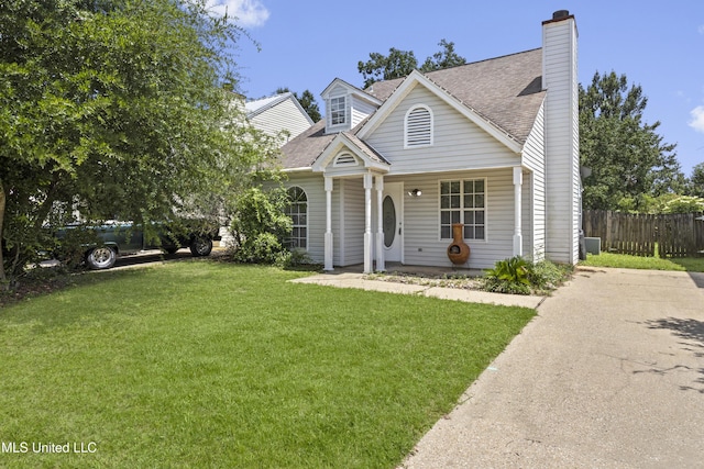 2383 Trafalgar Dr, Biloxi, MS 39531 - view of front of property with a shingled roof, covered porch, and a chimney