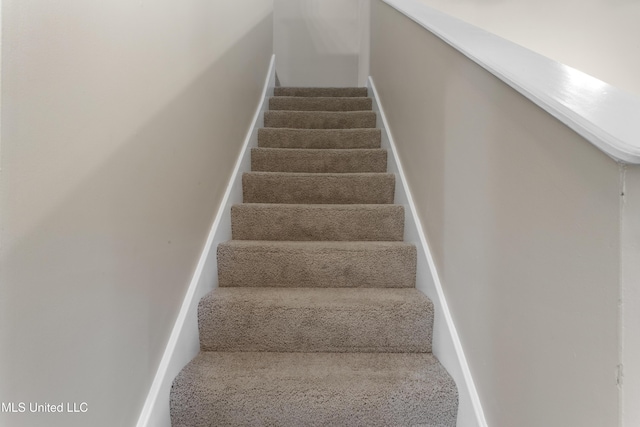 2383 Trafalgar Dr, Biloxi, MS 39531 - staircase featuring carpet floors