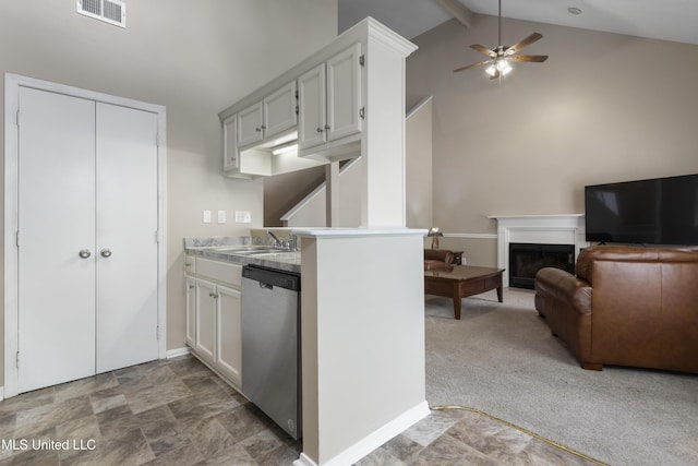2383 Trafalgar Dr, Biloxi, MS 39531 - kitchen featuring dishwasher, high vaulted ceiling, a fireplace, beamed ceiling, and ceiling fan