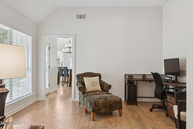 4275 Bienville Rd, Nesbit, MS 38651 - home office with plenty of natural light, light wood-type flooring, a chandelier, and vaulted ceiling