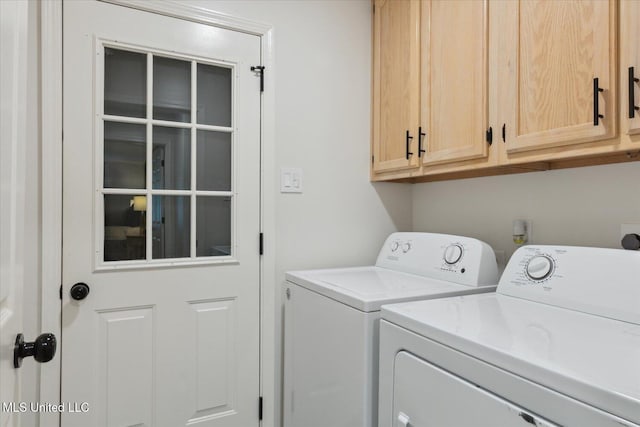 4275 Bienville Rd, Nesbit, MS 38651 - washroom featuring independent washer and dryer and cabinet space
