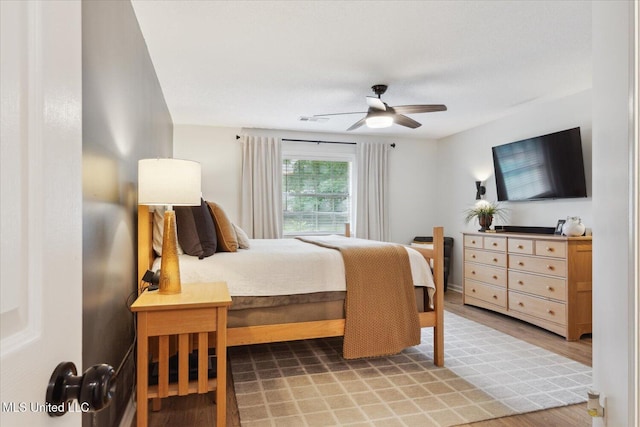 4275 Bienville Rd, Nesbit, MS 38651 - bedroom featuring light wood finished floors and a ceiling fan
