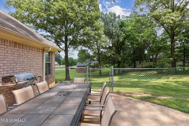 4275 Bienville Rd, Nesbit, MS 38651 - view of patio / terrace with outdoor dining area and a gate