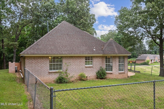 4275 Bienville Rd, Nesbit, MS 38651 - view of side of property with a shingled roof and brick siding