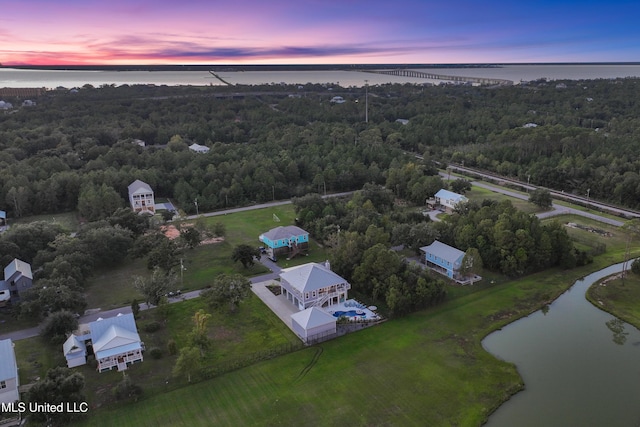 14 Sherman Ave, Pass Christian, MS 39571 - aerial view at dusk featuring a water view and a view of trees