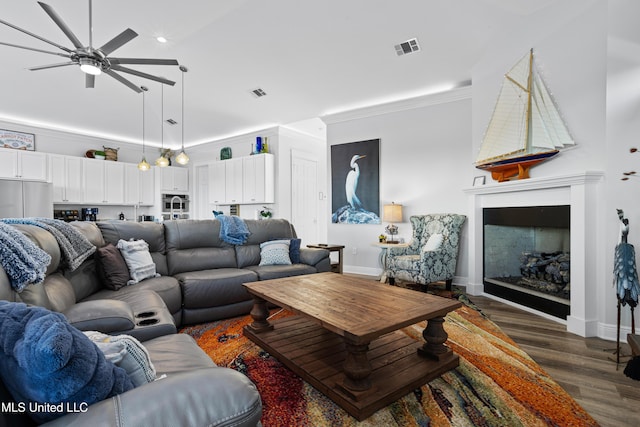 14 Sherman Ave, Pass Christian, MS 39571 - living room with visible vents, recessed lighting, a fireplace, ceiling fan, and dark wood-style floors