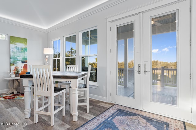 14 Sherman Ave, Pass Christian, MS 39571 - doorway with baseboards, plenty of natural light, and wood finished floors