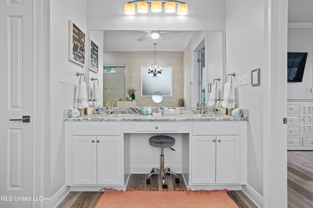 14 Sherman Ave, Pass Christian, MS 39571 - full bathroom with a stall shower, baseboards, and wood finished floors
