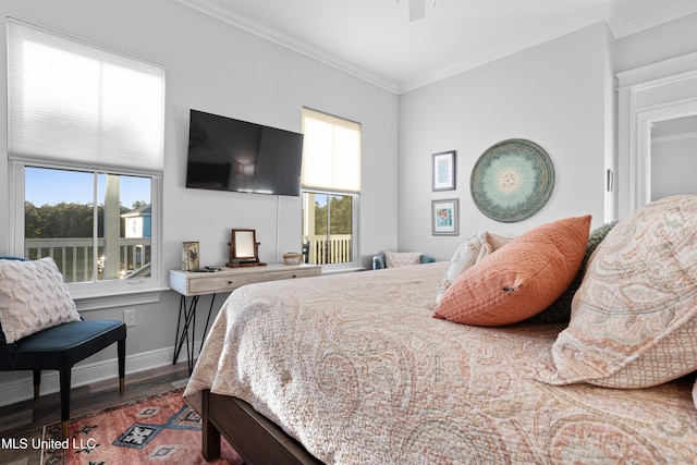 14 Sherman Ave, Pass Christian, MS 39571 - bedroom featuring ornamental molding, baseboards, a ceiling fan, and wood finished floors