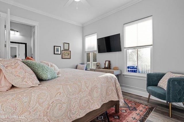 14 Sherman Ave, Pass Christian, MS 39571 - bedroom featuring ceiling fan, ornamental molding, baseboards, and wood finished floors