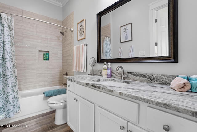 14 Sherman Ave, Pass Christian, MS 39571 - bathroom with toilet, wood finished floors, shower / bath combo with shower curtain, vanity, and ornamental molding