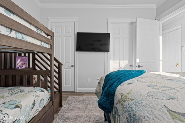 14 Sherman Ave, Pass Christian, MS 39571 - bedroom featuring ornamental molding and wood finished floors