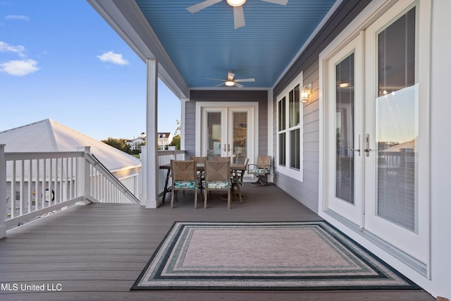14 Sherman Ave, Pass Christian, MS 39571 - wooden deck featuring ceiling fan, outdoor dining area, and french doors