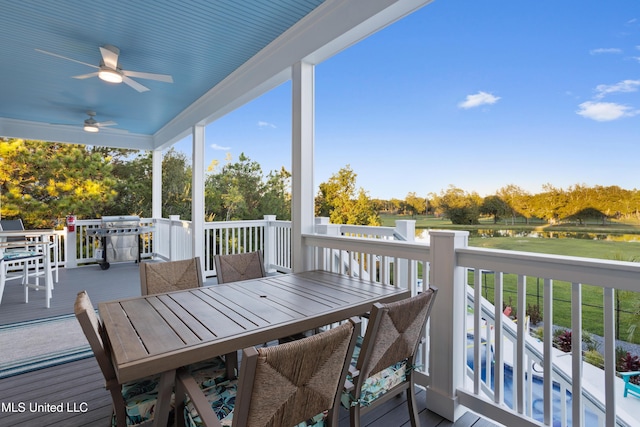 14 Sherman Ave, Pass Christian, MS 39571 - deck with area for grilling, a ceiling fan, and outdoor dining space
