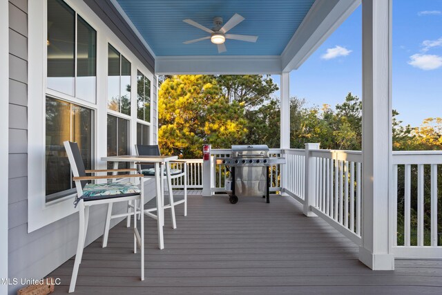 14 Sherman Ave, Pass Christian, MS 39571 - wooden terrace featuring ceiling fan