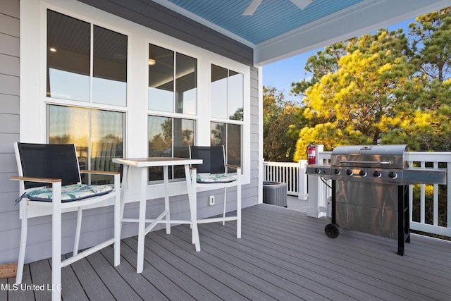 14 Sherman Ave, Pass Christian, MS 39571 - wooden deck featuring central air condition unit, ceiling fan, and grilling area