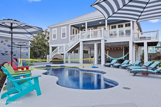 14 Sherman Ave, Pass Christian, MS 39571 - pool with a patio, a ceiling fan, a deck, stairway, and a fenced backyard