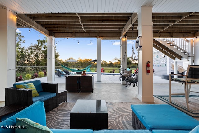 14 Sherman Ave, Pass Christian, MS 39571 - view of patio featuring outdoor dining area, stairs, and outdoor lounge area