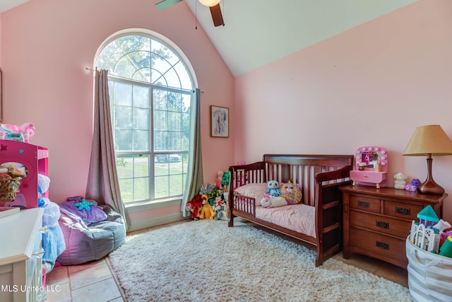 bedroom featuring ceiling fan and lofted ceiling