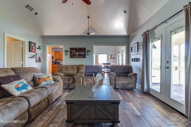 living room with french doors, ceiling fan, high vaulted ceiling, and dark hardwood / wood-style flooring