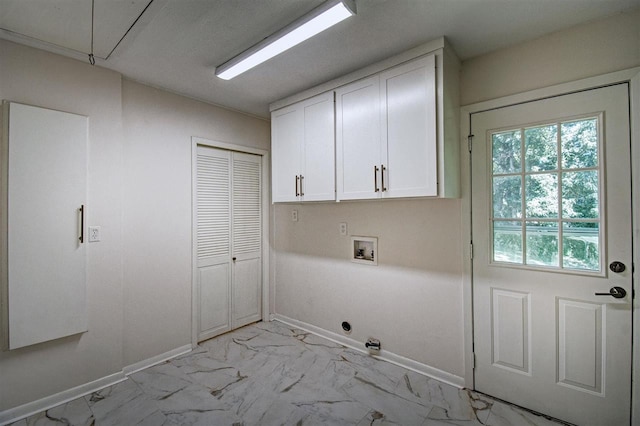 laundry room with cabinets, hookup for a washing machine, and hookup for an electric dryer