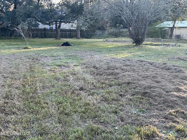 view of yard with fence