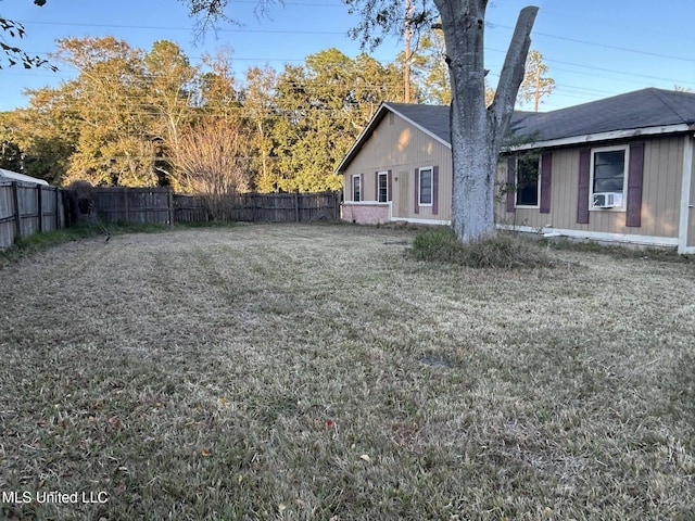 view of yard featuring cooling unit and a fenced backyard