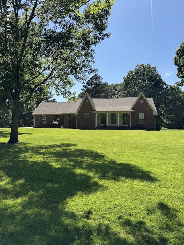 5205 Marthavale Cv, Southaven, MS 38671 - ranch-style house featuring a front yard and brick siding