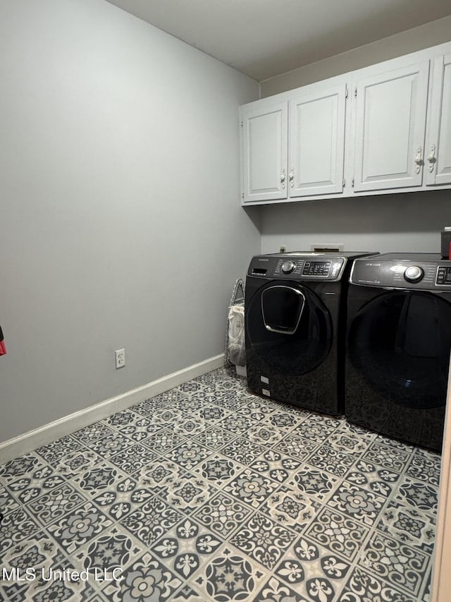 5205 Marthavale Cv, Southaven, MS 38671 - washroom with cabinet space, washing machine and clothes dryer, and baseboards