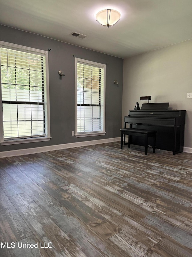 5205 Marthavale Cv, Southaven, MS 38671 - living area with dark wood finished floors, healthy amount of natural light, and baseboards