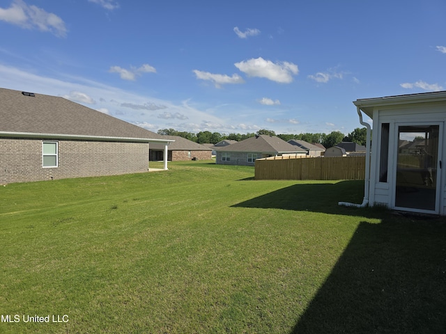 view of yard featuring fence