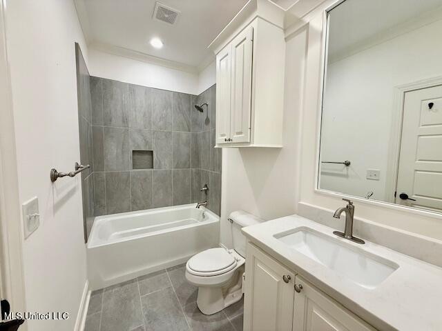full bath featuring toilet, vanity, shower / bath combination, tile patterned flooring, and baseboards
