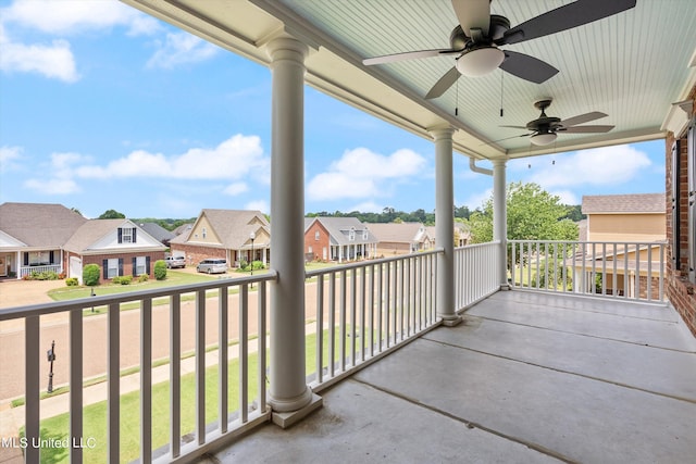 balcony featuring ceiling fan