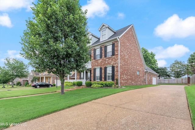 view of front facade with a front lawn