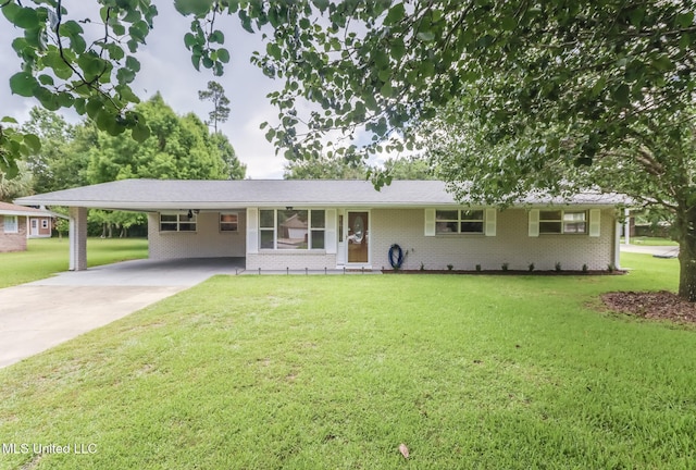 31 55th St, Gulfport, MS 39507 - ranch-style home featuring brick siding, a front lawn, a carport, and concrete driveway