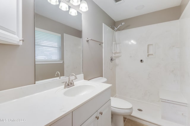 31 55th St, Gulfport, MS 39507 - bathroom featuring vanity, a shower, and tile patterned flooring