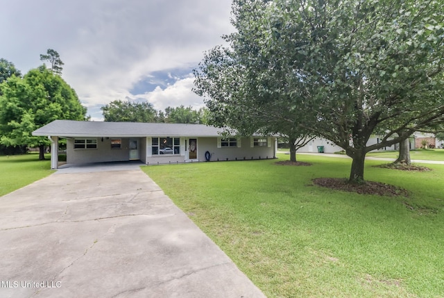 31 55th St, Gulfport, MS 39507 - ranch-style house with driveway, a front yard, and an attached carport