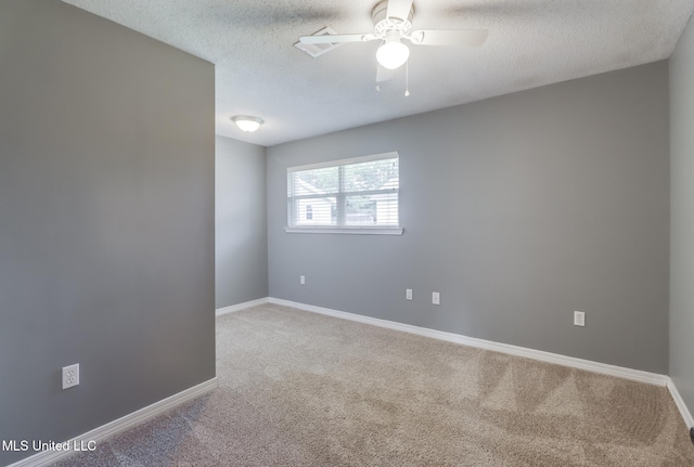 31 55th St, Gulfport, MS 39507 - empty room with carpet flooring, ceiling fan, and a textured ceiling