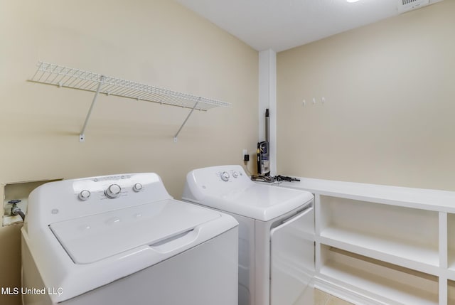 31 55th St, Gulfport, MS 39507 - laundry area with independent washer and dryer