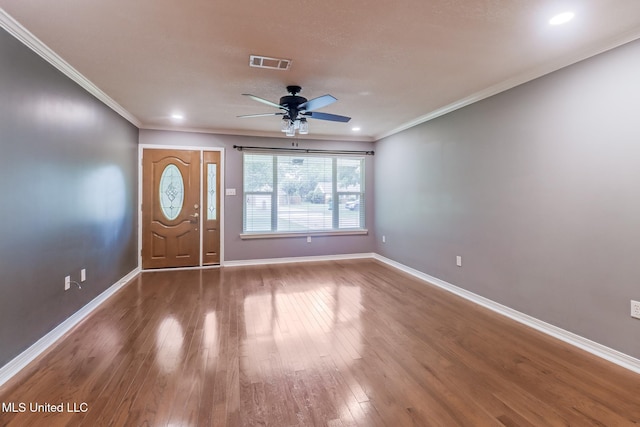 31 55th St, Gulfport, MS 39507 - entrance foyer featuring ceiling fan, wood finished floors, crown molding, and recessed lighting