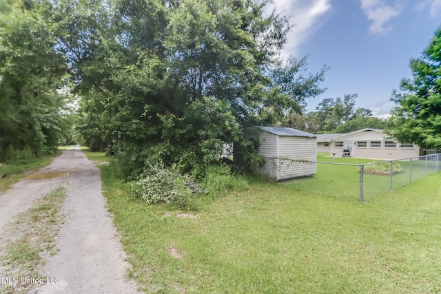 31 55th St, Gulfport, MS 39507 - view of yard featuring an outbuilding