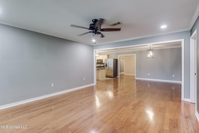 31 55th St, Gulfport, MS 39507 - unfurnished living room with a ceiling fan, ornamental molding, and light wood-style floors