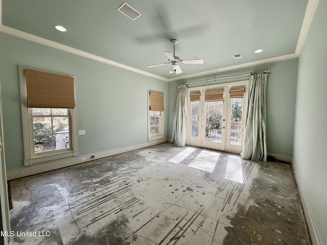 unfurnished room with visible vents, baseboards, ceiling fan, and crown molding