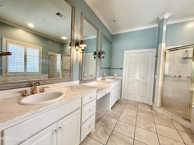 full bath with crown molding, a sink, and a shower stall