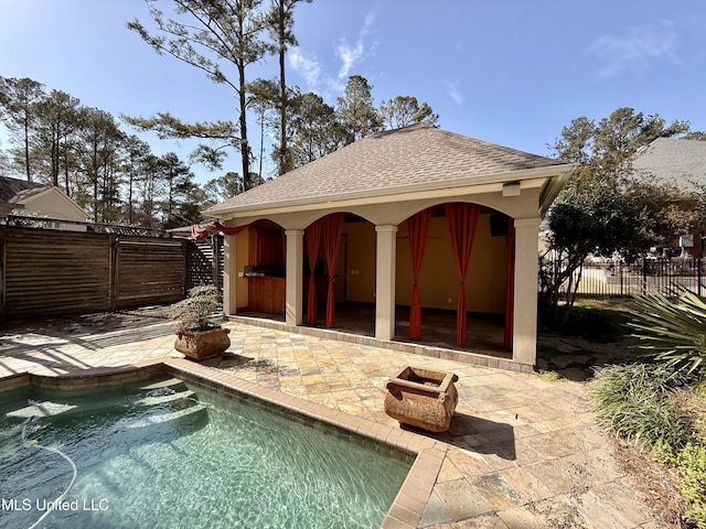 exterior space featuring a patio and fence