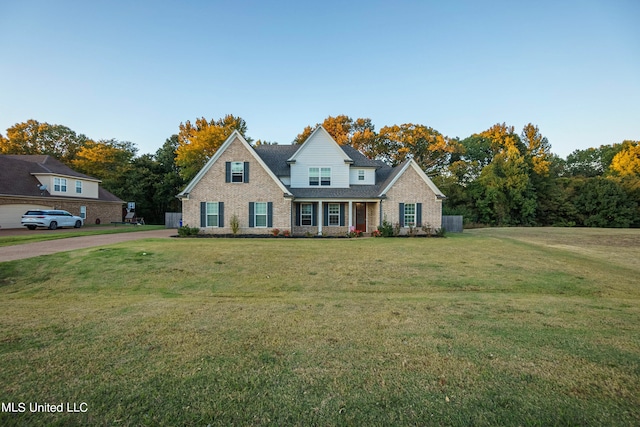 view of front of home with a front lawn