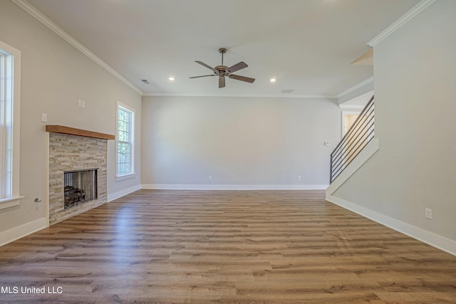 5640 Drew Glazer Dr, Olive Branch, MS 38654 - unfurnished living room with recessed lighting, ceiling fan, wood finished floors, baseboards, and a stone fireplace