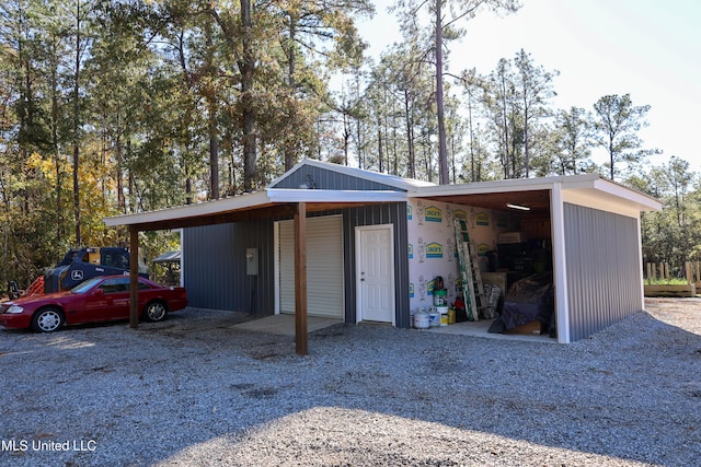 garage with a carport